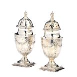 PAIR OF SILVER PEPPERETTES