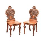 PAIR OF VICTORIAN CARVED OAK HALL CHAIRS