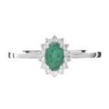 18CT WHITE GOLD EMERALD AND DIAMOND RING