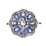 SILVER-ON-GOLD SAPPHIRE AND DIAMOND CLUSTER RING