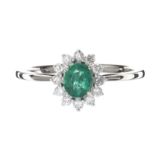 18CT WHITE GOLD EMERALD AND DIAMOND RING