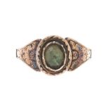 ANTIQUE 9CT GOLD ENGRAVED RING SET WITH A GREEN STONE