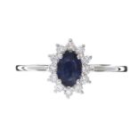 18CT WHITE GOLD SAPPHIRE AND DIAMOND RING