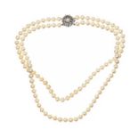 DOUBLE STRAND OF FAUX PEARLS WITH CRYSTAL-SET CLASP