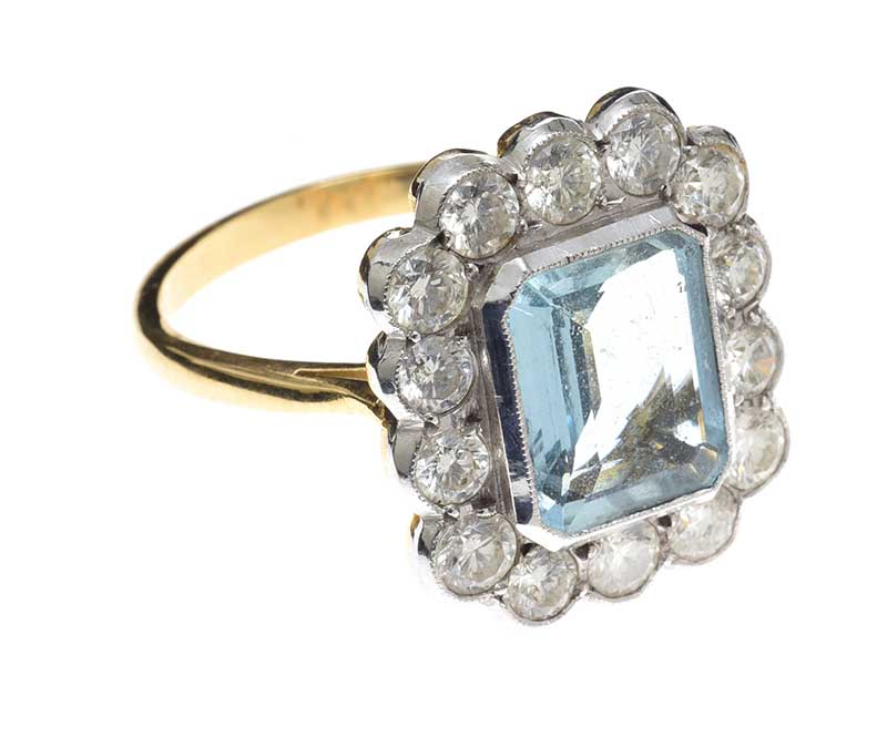 18CT GOLD AQUAMARINE AND DIAMOND CLUSTER RING