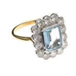 18CT GOLD AQUAMARINE AND DIAMOND CLUSTER RING