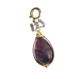 18CT GOLD REVERSABLE PENDANT SET WITH AMETHYST AND JADE WITH A DIAMOND-SET BOW