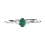 18CT WHITE GOLD EMERALD AND DIAMOND RING