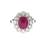 18CT WHITE GOLD RUBY AND DIAMOND CLUSTER RING