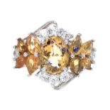 STERLING SILVER RING SET WITH AMBER-COLOURED STONES AND CUBIC ZIRCONIA