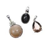 THREE STERLING SILVER GEM-SET PENDANTS