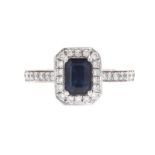 18CT WHITE GOLD SAPPHIRE AND DIAMOND CLUSTER RING