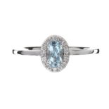 18CT WHITE GOLD AQUAMARINE AND DIAMOND RING