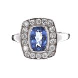 18CT WHITE GOLD SAPPHIRE AND DIAMOND CLUSTER RING