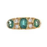 18CT GOLD EMERALD AND DIAMOND RING