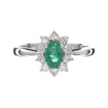 18CT WHITE GOLD EMERALD AND DIAMOND RING