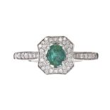 18CT WHITE GOLD EMERALD AND DIAMOND RING