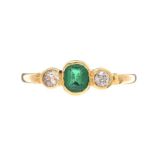 18CT GOLD EMERALD AND DIAMOND THREE STONE RING