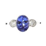 PLATINUM TANZANITE AND DIAMOND THREE STONE RING