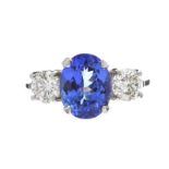 PLATINUM TANZANITE AND DIAMOND THREE STONE RING