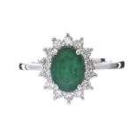 18CT WHITE GOLD EMERALD AND DIAMOND RING