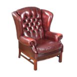 DEEP BUTTON LEATHER WINGED BACK ARMCHAIR