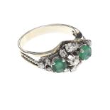 18CT WHITE GOLD EMERALD AND DIAMOND RING