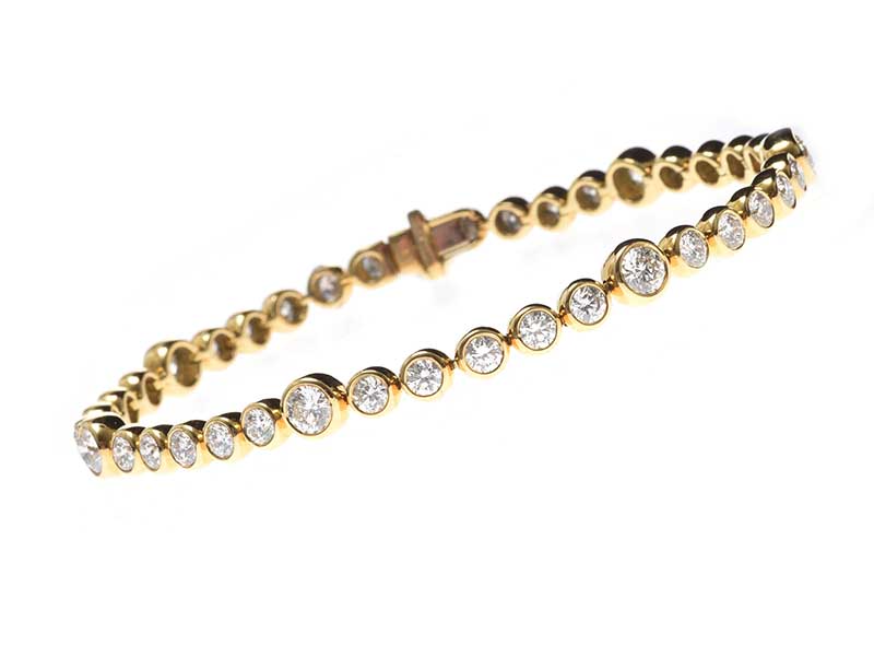 18CT GOLD DIAMOND TENNIS BRACELET