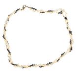 TRIPLE STRAND OF FRESHWATER PEARLS AND BEAD NECKLACE WITH GOLD PLATED CLASP