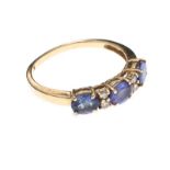 14CT GOLD TANZANITE AND DIAMOND RING