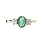 18CT GOLD EMERALD AND DIAMOND RING