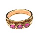 18CT GOLD THREE STONE RUBY RING