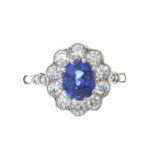 18CT WHITE GOLD SAPPHIRE AND DIAMOND CLUSTER RING