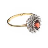 9CT GOLD GARNET AND DIAMOND CLUSTER RING