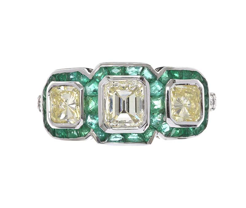 18CT WHITE GOLD EMERALD AND DIAMOND TRIPLE CLUSTER RING