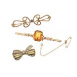 THREE 9CT GOLD BROOCHES