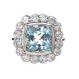 18CT GOLD AQUAMARINE AND DIAMOND CLUSTER RING