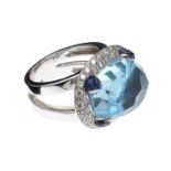 18CT WHITE GOLD DIAMOND, SAPPHIRE AND TOPAZ RING