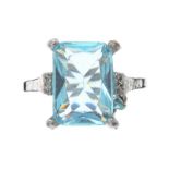 COSTUME RING WITH A BLUE STONE
