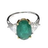 18CT WHITE GOLD EMERALD AND DIAMOND RING