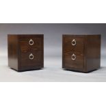 A pair of contemporary stained wood bedside tables, of recent manufacture, each with two drawers,