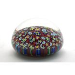 A large Italian Murano glass paperweight, mid/late 20th century, inset to clear glass with white