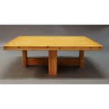 A modern pine coffee table, of recent manufacture, the square top on square legs joined by