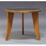 An Italian mirror top occasional table, c.1950, the circular mirrored top, raised on curved and