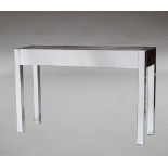 A mirrored and faux shagreen console table, of recent manufacture, the rectangular top inset with