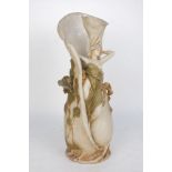 A Royal Dux porcelain figural vase, of furling form, moulded with the figure of a nude woman,