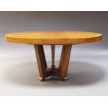 A modern walnut extending dining table, of recent manufacture, the parquetry top on square