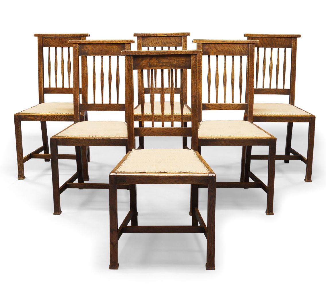 Arts & Crafts, a set of six oak dining chairs Early 20th Century With slatted backs, above