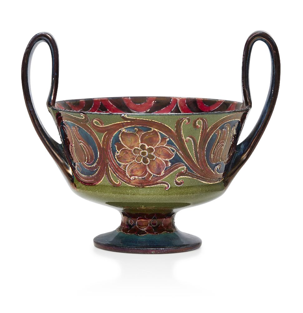 William Moorcroft (1872-1945), a twin-handled ceramic bowl with red lustre c.1910, signed in green W