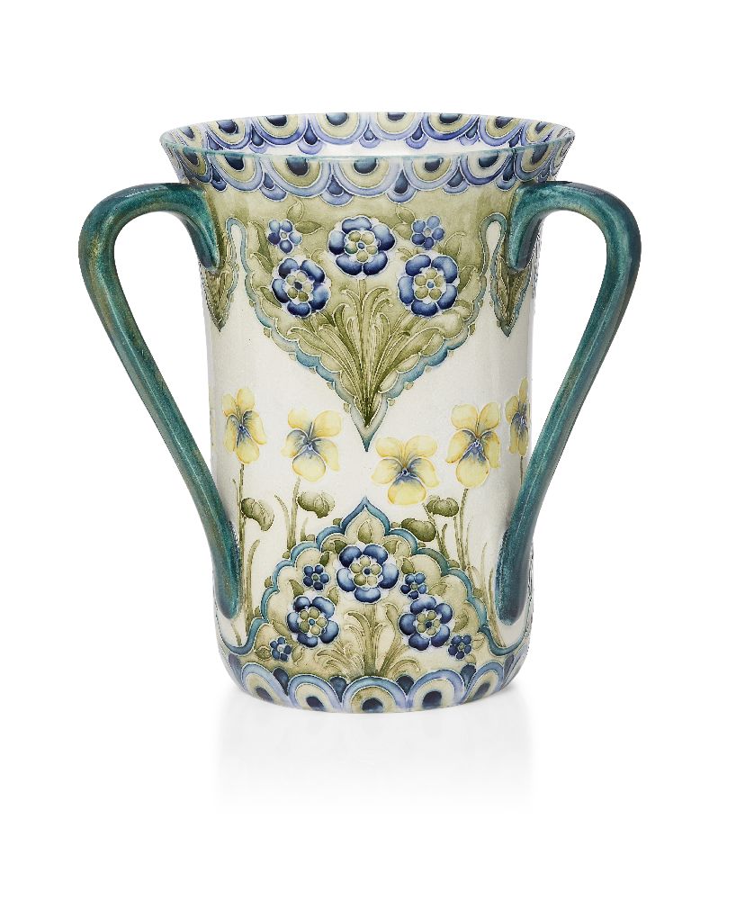 William Moorcroft (1872-1945), a Forget-Me-Not pattern three-handled ceramic vase c.1900, signed